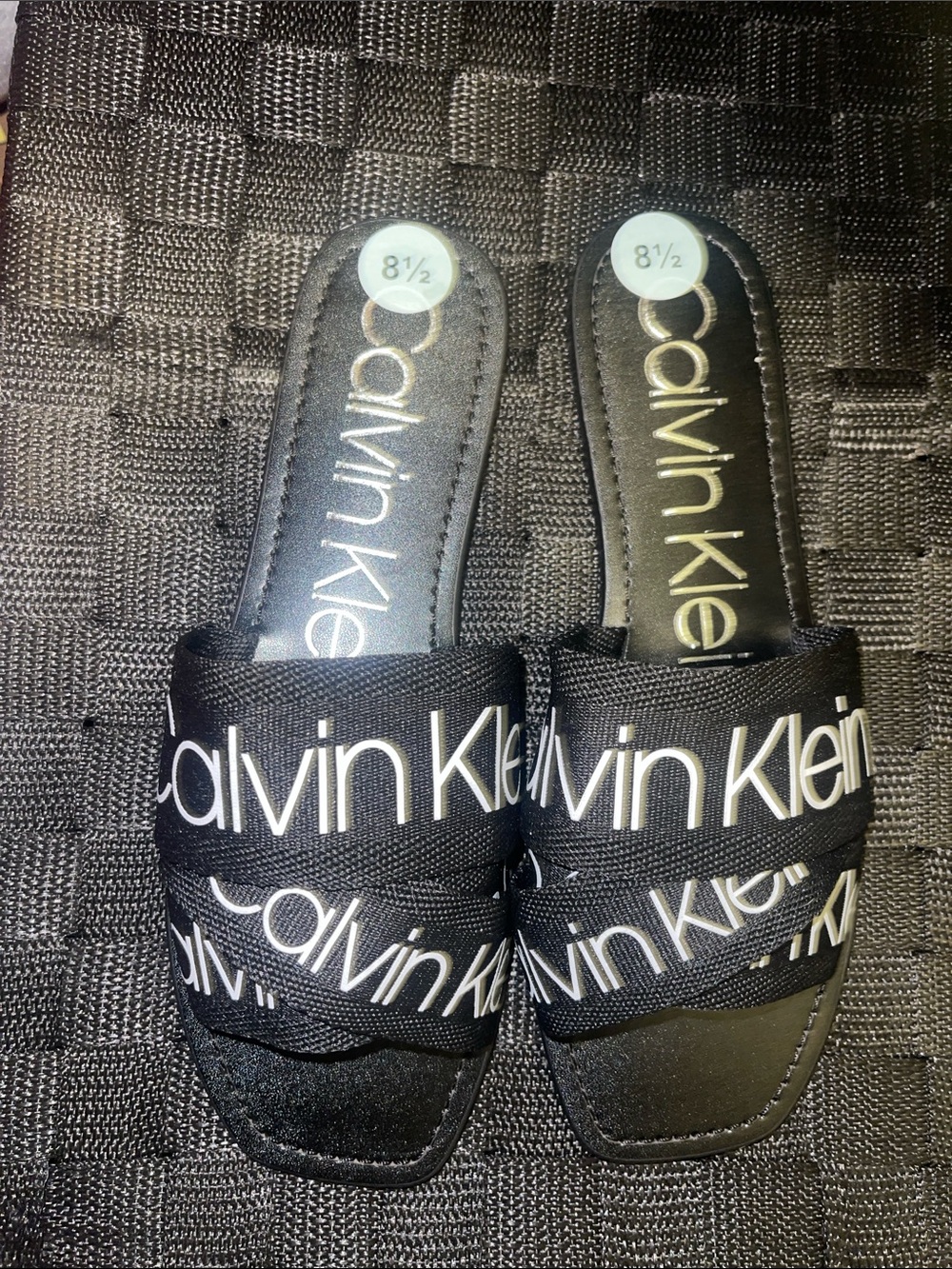 Calvin Klein Black Slide Sandals with White Logo Strap - Picture 2 of 4